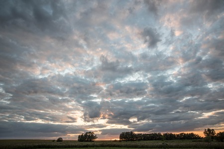 Beautiful landscape with a sunset skyの写真素材