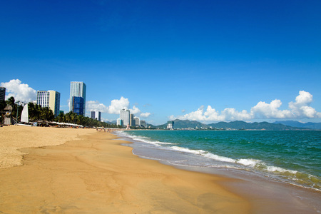 Panoramic view of a tropical beach with blue sky in sunny dayの写真素材