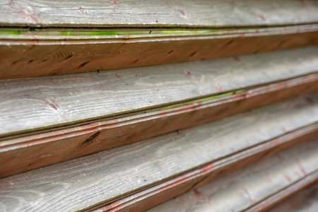 Abstract wooden fence texture closeup as a background. Shallow DOF