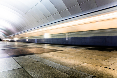Subway metro train arriving at a station. Motion blurr effectの写真素材