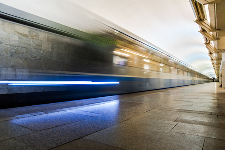 Subway metro train arriving at a station. Motion blurr effectの写真素材
