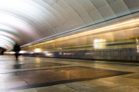Subway metro train arriving at a stationの写真素材
