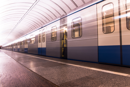 Subway metro train arriving at a stationの写真素材