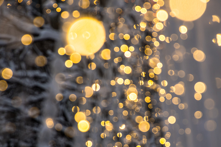 abstract background with bokeh defocused lightsの写真素材