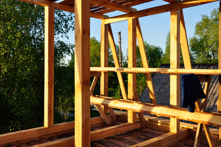 Building new wooden house, under construction workの写真素材