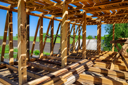 Building new wooden house, under construction workの写真素材