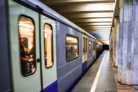Subway train in motion arriving at stationの写真素材