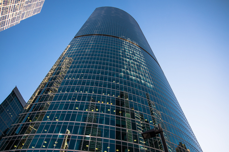 low angle view of skyscraper in cityの写真素材