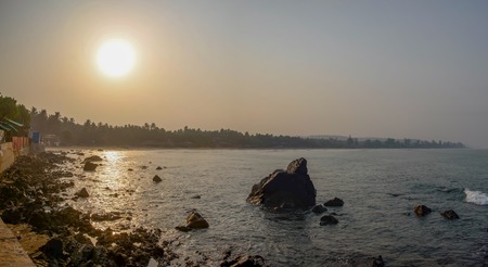 morning sunrise on the sea beach, rocky shoreの写真素材