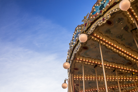 French carousel orleans ride against blue skyの写真素材