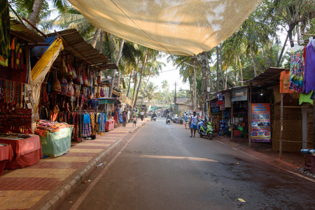 Arambol, Goa, Iindia - March 22, 2017: Street shops of sale of souvenirs and clothes for tourists