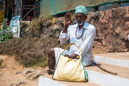 Old Indian Man portrait shot outside goa