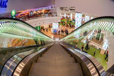 Moscow, Russia - December 10, 2017: Escalator in Columbus shopping mall with fisheye effectのeditorial素材