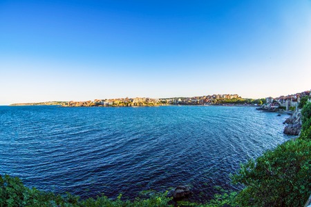 Sunset bay view of old town with fisheye effectの写真素材