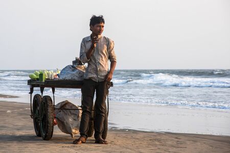 India, Goa, March 22 2017 Seller on the beach Goaのeditorial素材