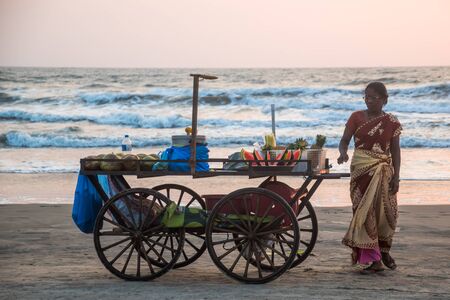 India, Goa, March 22 2017 Seller on the beach Goaのeditorial素材