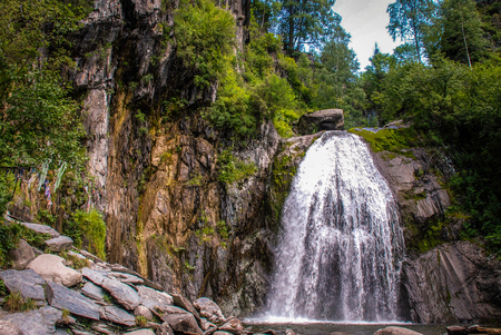 Nature landscape of waterfall in mountain forestの写真素材