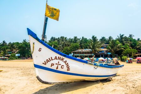 India, Goa, March 31 2017: Fishing boat stand on the sand in Arambolのeditorial素材