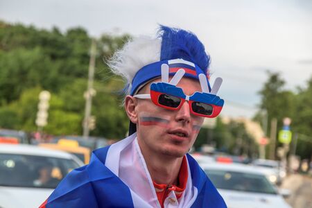 Moscow, Russia, June 14 2018 Russian football supporter fans near Luzhniki Stadium before the opening of the World Cupのeditorial素材