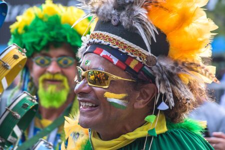 Moscow, Russia, June 14 2018 Brazilian football supporter fans near Luzhniki Stadium before the opening of the World Cupのeditorial素材