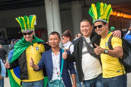 Moscow, Russia, June 14 2018 Brazilian football supporter fans near Luzhniki Stadium before the opening of the World Cupのeditorial素材