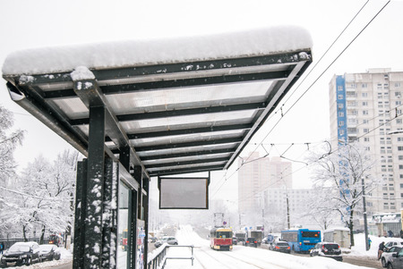 Winter city public transport stop perspective viewの写真素材