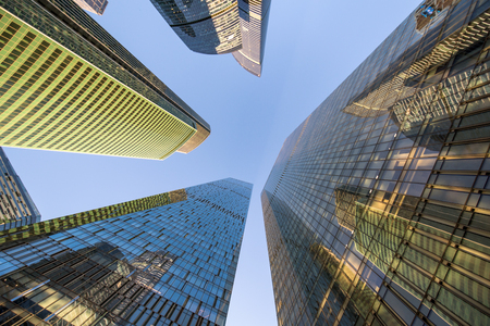 perspective bottom up view on business district skyscrapersの写真素材