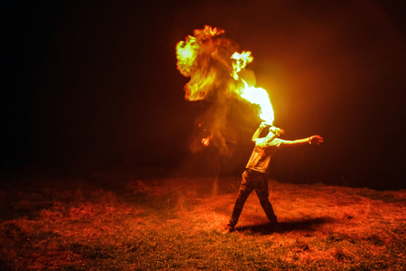 amazing night paty fire show on black backgroundの写真素材