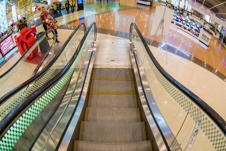 Moscow, Russia - December 10, 2017: Escalator in Columbus shopping mall with fisheye effectのeditorial素材