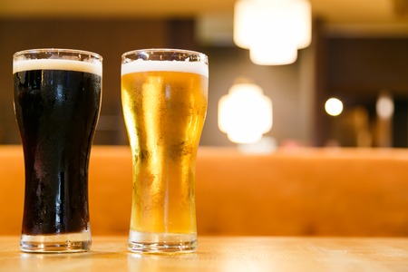Cold alcoholic beverages by the glass pint for menの写真素材