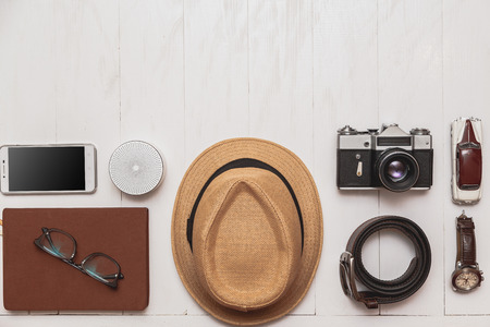 accessories traveler set the pensioner on a white wooden table.の写真素材