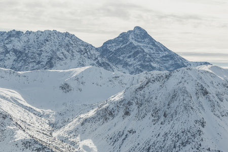 Snowy peak Swinica of the Tatry mountains on the border of Poland and Slovakia.の写真素材