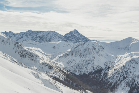Snowy peak Swinica of the Tatry mountains on the border of Poland and Slovakiaの写真素材