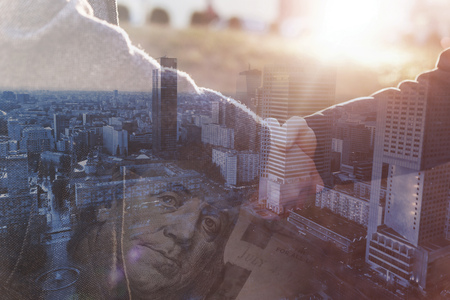 Male handshake at a business meeting concept. Mixed photo.の写真素材