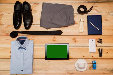 Set of clothes and accessories for man on wooden backgroundの写真素材