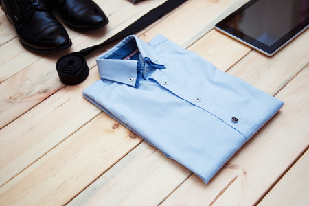 Set of clothes and accessories for man on wooden backgroundの写真素材