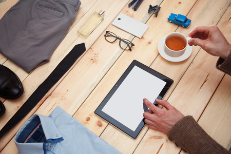 Set of clothes and accessories for man on wooden backgroundの写真素材