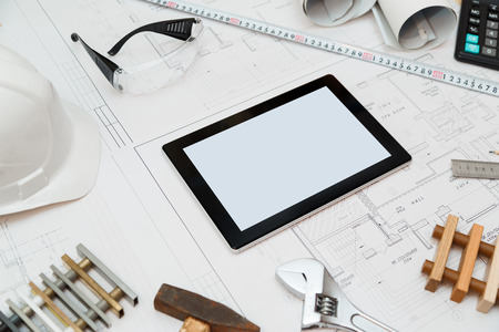 Construction plans with Tablet, drawings and tools.の写真素材
