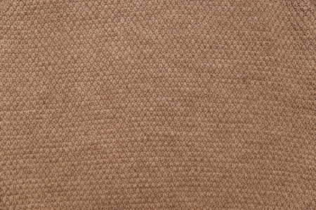 Winter Sweater Design. Brown knitted fabric texture.の写真素材