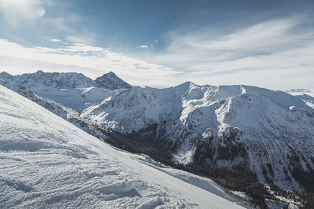 Wide view of the snowy peaks of the Tatry mountains on the border of Poland and Slovakia.の写真素材