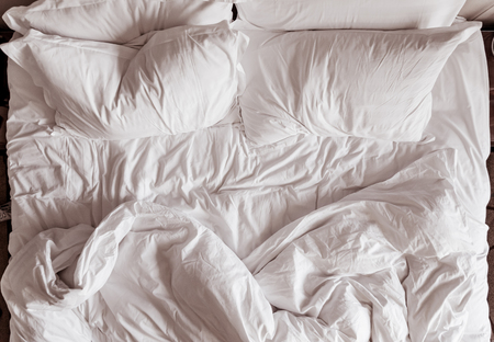 Top view of bedding sheets and pillowの写真素材