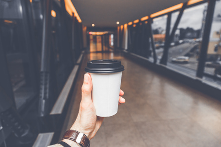 Drink coffee on the way to work.の写真素材