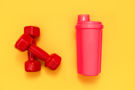 Two red womens dumbbells. Fitness conceptの写真素材