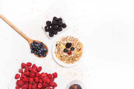 Healthy breakfast. Food cereal concept with fresh fruits isolated on whiteの写真素材