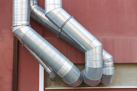 Air vent ducts of air conditioning and ventilation system on the wallの写真素材