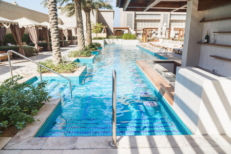 Outdoor swimming pool with clean waterの写真素材