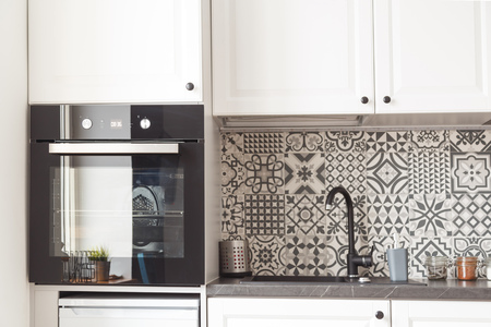 Modern kitchen interior with built-in appliancesの写真素材