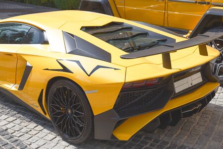 DUBAI, UAE - JANUARY 08, 2019: yellow luxury supercar Lamborghini Aventador Roadster in Dubaiのeditorial素材