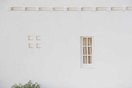 View of the white stone house. Minimalism and free space for background concept.の写真素材