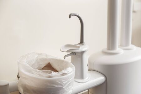 Close-up dentist sink with tap equipmentの写真素材